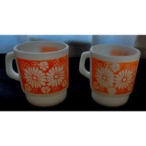 Fire King milk glass stacking mugs. Orange daisy